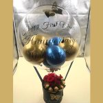 Golden and blue anniversary balloon baskets from Same Day Flowers.