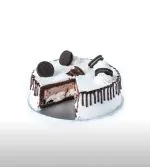 A delectable Oreo Ice Cream Cake featuring creamy layers of ice cream and crunchy Oreo cookie bits, beautifully presented.