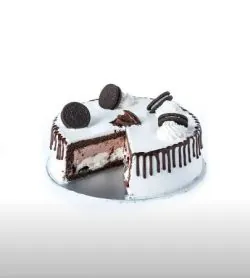 A delectable Oreo Ice Cream Cake featuring creamy layers of ice cream and crunchy Oreo cookie bits, beautifully presented.